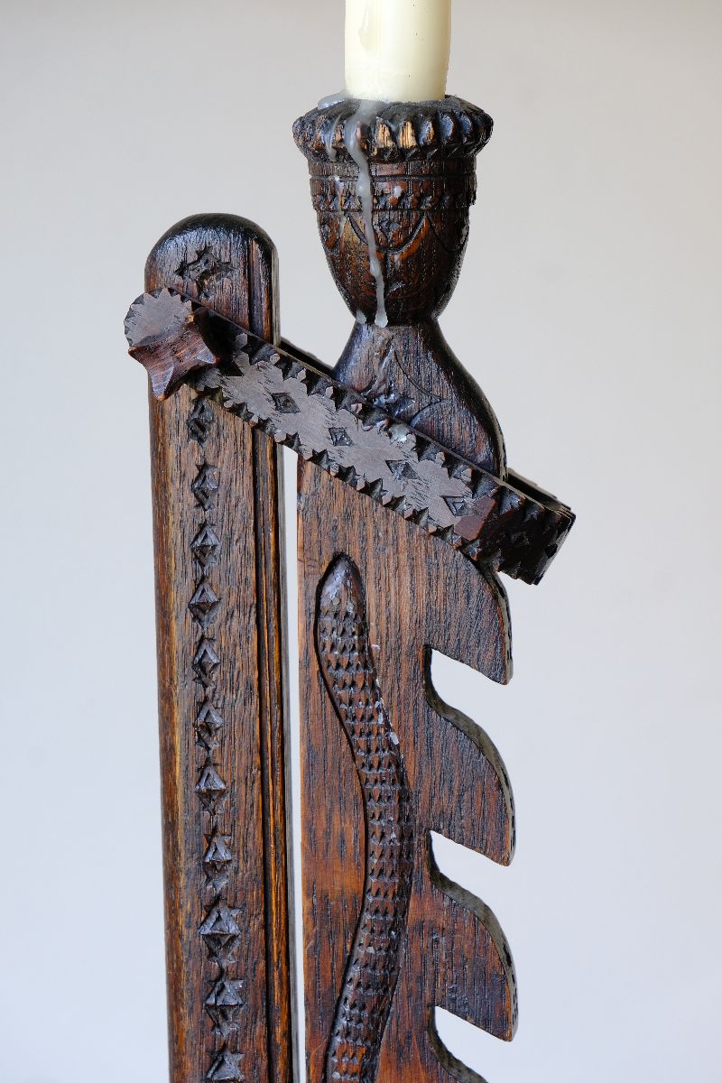 Chip carved detail on a Rare Arts & Crafts Carved Oak Ratchet Adjustable Candle Stand