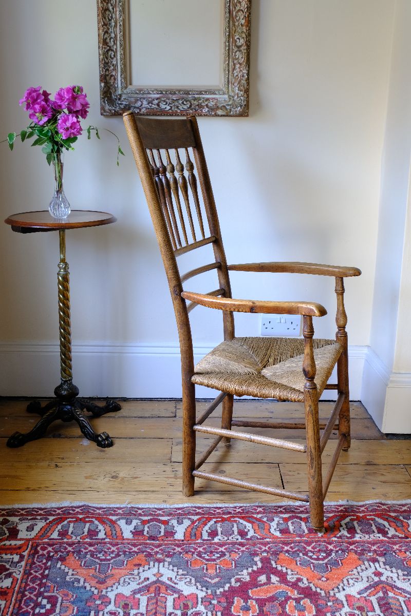 side view on a Stamped upright  on a Philip Clissett Spindle Back Armchair Herefordshire Circa 1890