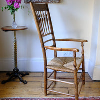 side view on a Stamped upright  on a Philip Clissett Spindle Back Armchair Herefordshire Circa 1890