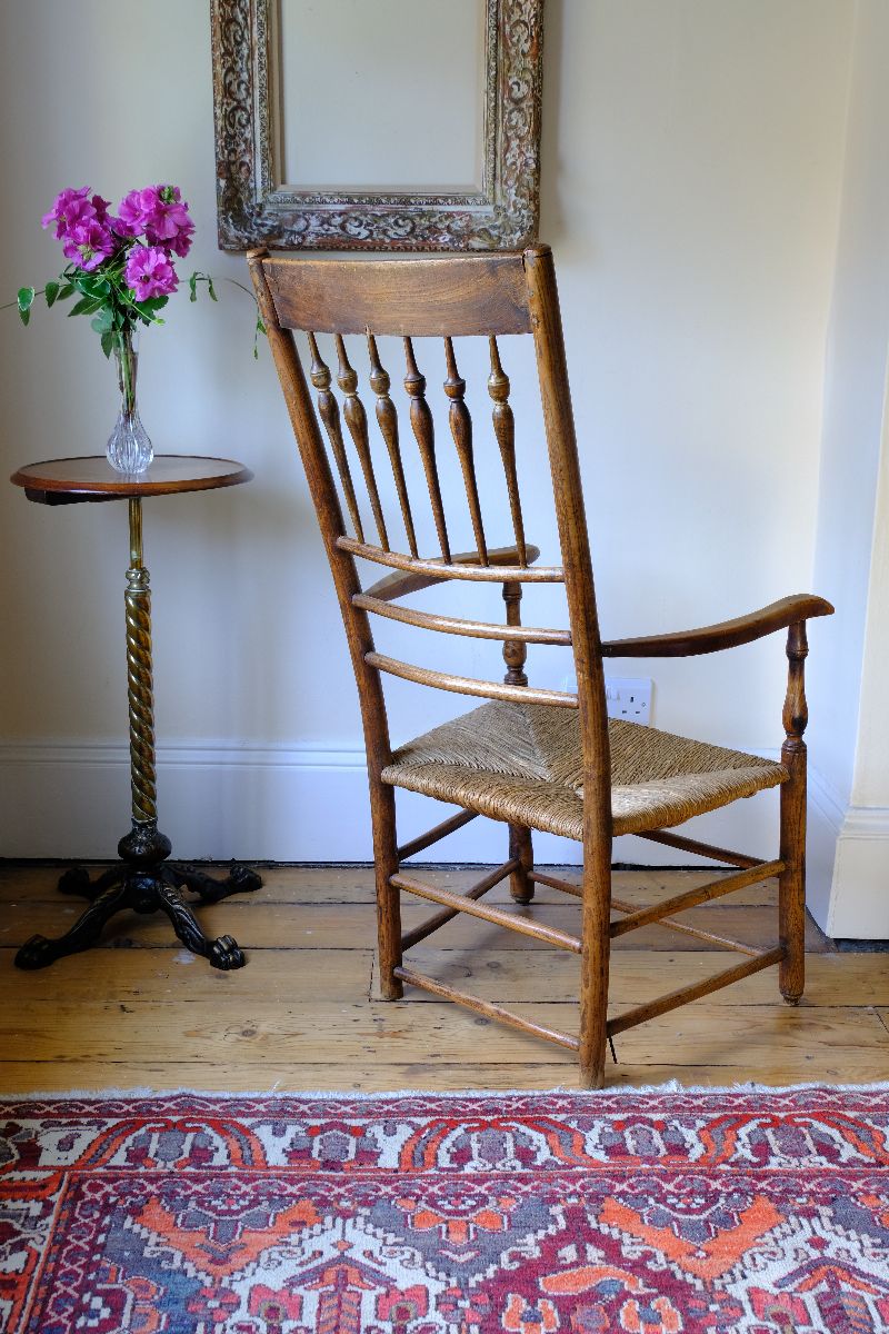 back view on a Stamped upright  on a Philip Clissett Spindle Back Armchair Herefordshire Circa 1890
