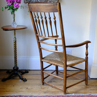 back view on a Stamped upright  on a Philip Clissett Spindle Back Armchair Herefordshire Circa 1890