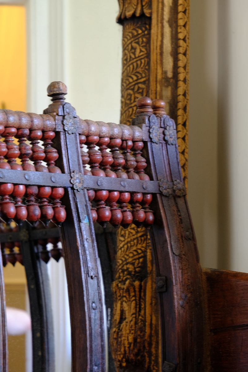 Turned Spindle Gallery on a Late 19th Century Gujarati Hardwood Hall Bench with Original Polychrome Finish, Turned Gallery Back and Brass Rosette Mounts