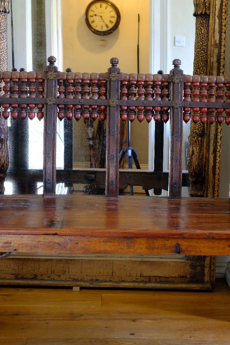Turned Spindle Gallery on a Late 19th Century Gujarati Hardwood Hall Bench with Original Polychrome Finish, Turned Gallery Back and Brass Rosette Mounts