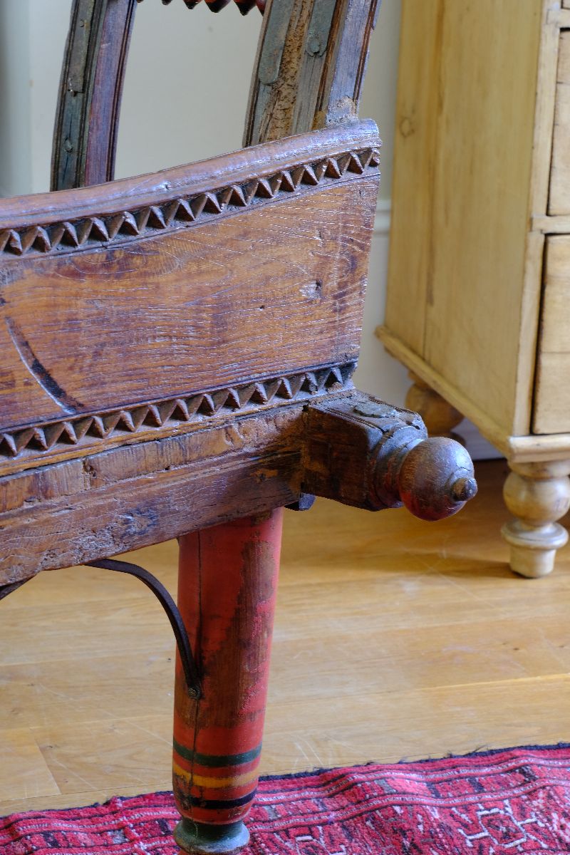 Side finial on a Late 19th Century Gujarati Hardwood Hall Bench with Original Polychrome Finish, Turned Gallery Back and Brass Rosette Mounts
