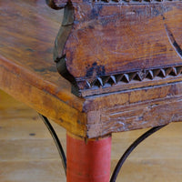 Close up detailed arm on a Late 19th Century Gujarati Hardwood Hall Bench with Original Polychrome Finish, Turned Gallery Back and Brass Rosette Mounts