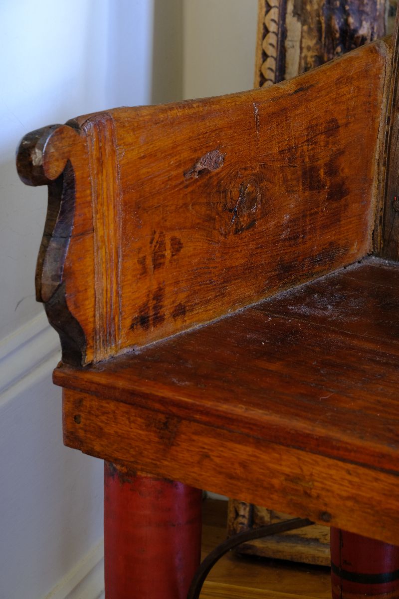 Internal warm timber colour on a Late 19th Century Gujarati Hardwood Hall Bench with Original Polychrome Finish, Turned Gallery Back and Brass Rosette Mounts