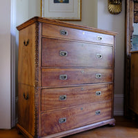 side shot of the Camphor Wood Campaign Secretaire Chest by Phelps Ltd., c.1890–1915