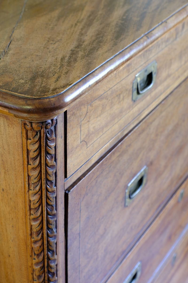 Curved corner top and carved pilaster on the Camphor Wood Campaign Secretaire Chest by Phelps Ltd. with Fitted Writing Desk and Original Label