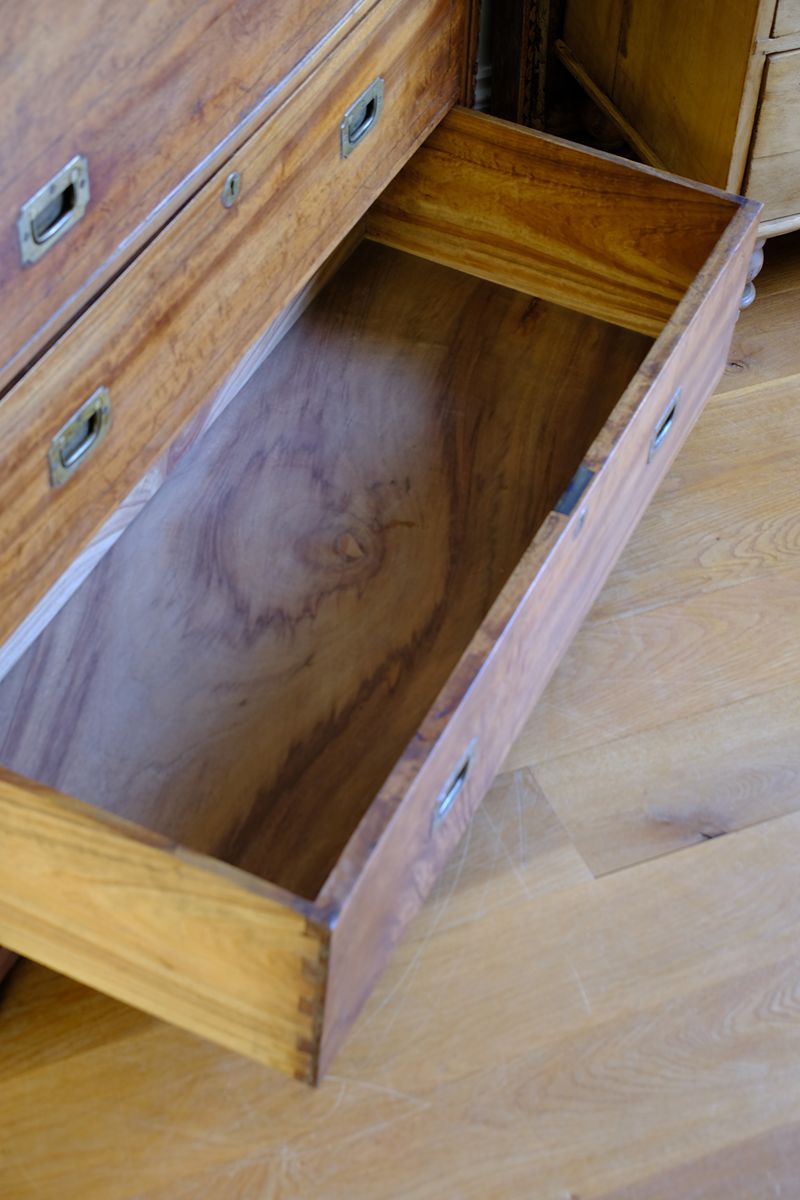 Solid drawer bottoms on the Camphor Wood Campaign Secretaire Chest by Phelps Ltd. with Fitted Writing Desk and Original Label