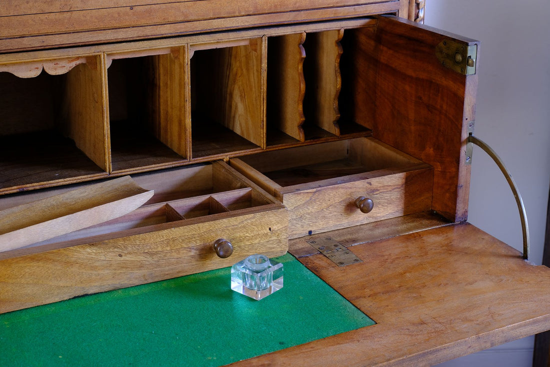 Cut glass ink well in the Camphor Wood Campaign Secretaire Chest by Phelps Ltd., c.1890–1915