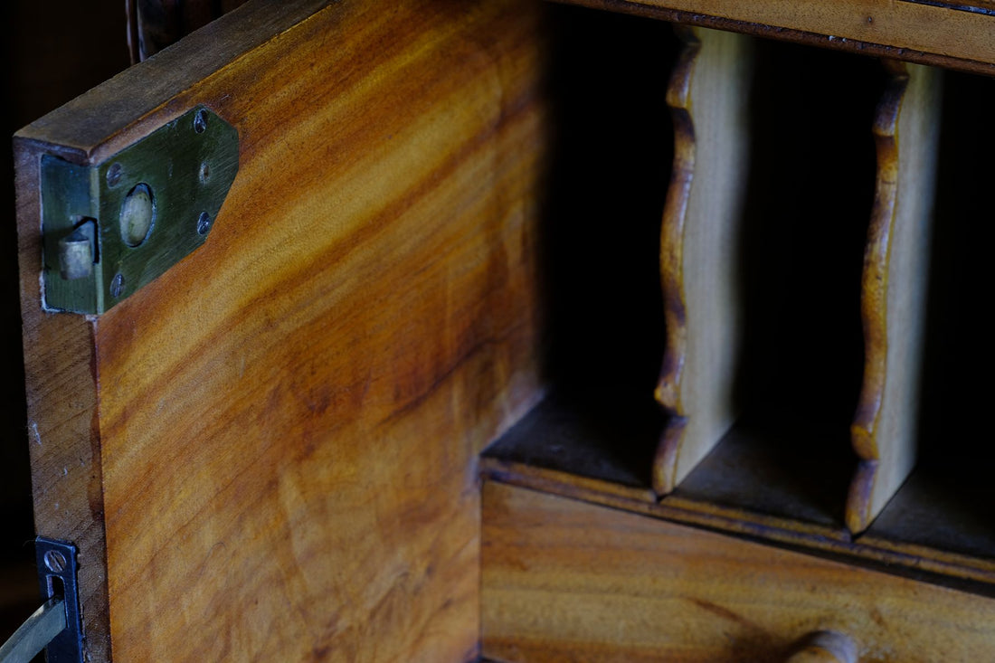 Brass catch latch on the inside of the Camphor Wood Campaign Secretaire Chest by Phelps Ltd. with Fitted Writing Desk and Original Label