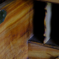 Brass catch latch on the inside of the Camphor Wood Campaign Secretaire Chest by Phelps Ltd. with Fitted Writing Desk and Original Label