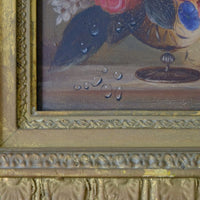 Cloe up of water droplets on an English School antique oil on board still life of garden flowers in original gilt carved frame