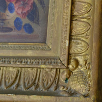 Picture frame moulding detail on a English School antique oil on board still life of garden flowers in original gilt carved frame