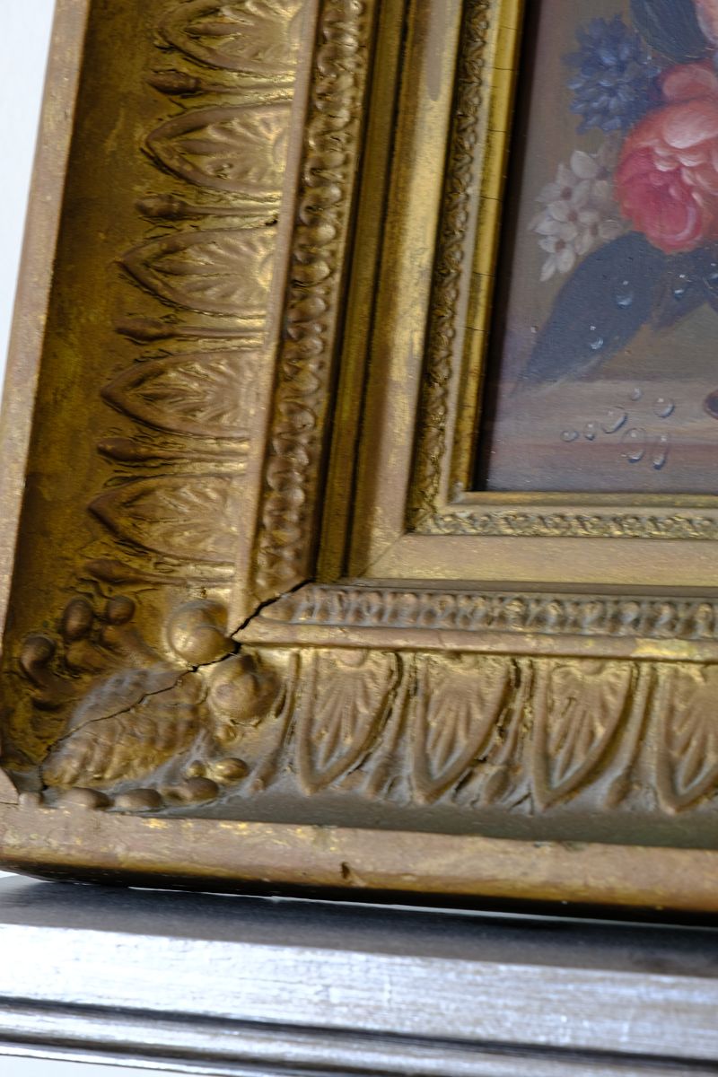 frame close up on a English School antique oil on board still life of garden flowers in original gilt carved frame