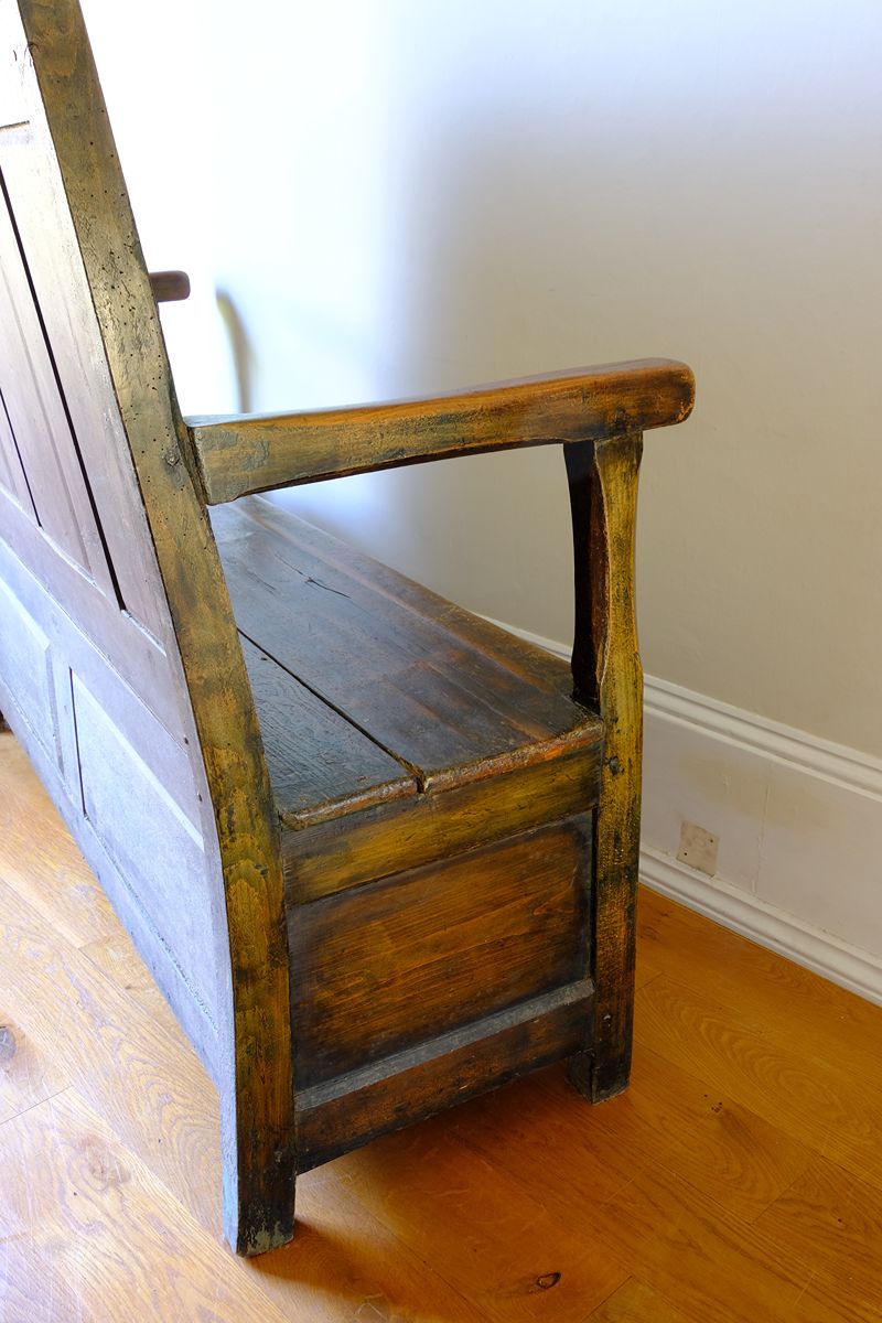 Painted detail on the 19th Century Welsh Oak Settle Bench with Painted Panels and Storage Chest