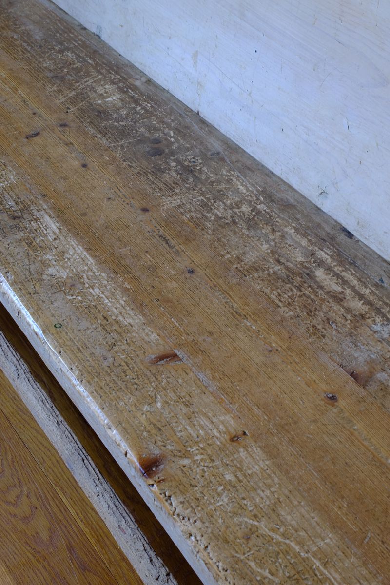 Worn seat on a 19th Century Gothic Painted Pine Hall Bench with Gothic Fretwork and Original Painted Finish