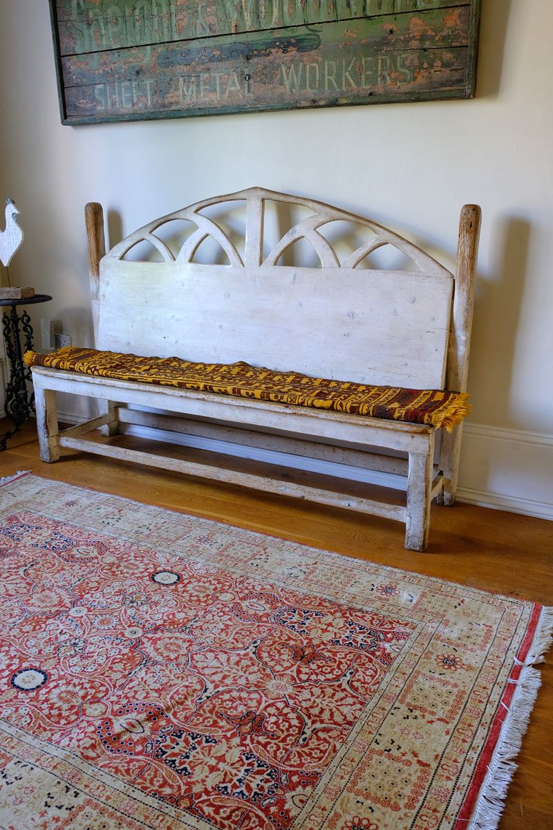 Shown with a kilim on a 19th Century Gothic Painted Pine Hall Bench with Gothic Fretwork and Original Painted Finishm on a 