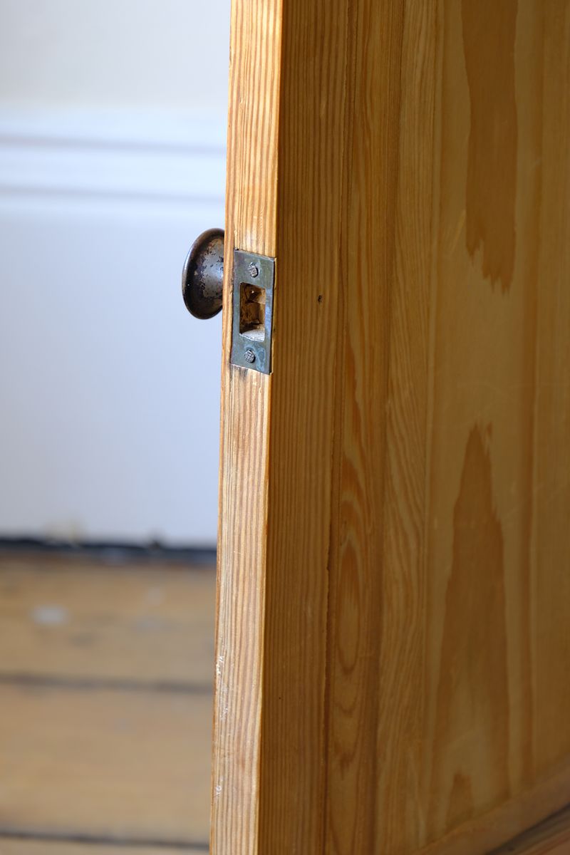 recessed catch receiver on a Late Victorian pine marble top bedside cupboard with Carrara marble and concealed brass pivot hinges