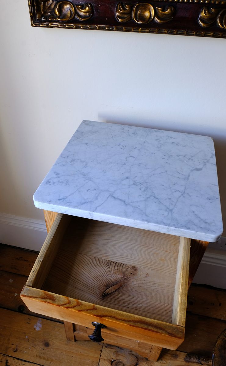 Veined marble top on a Late Victorian pine marble top bedside cupboard with Carrara marble and concealed brass pivot hinges