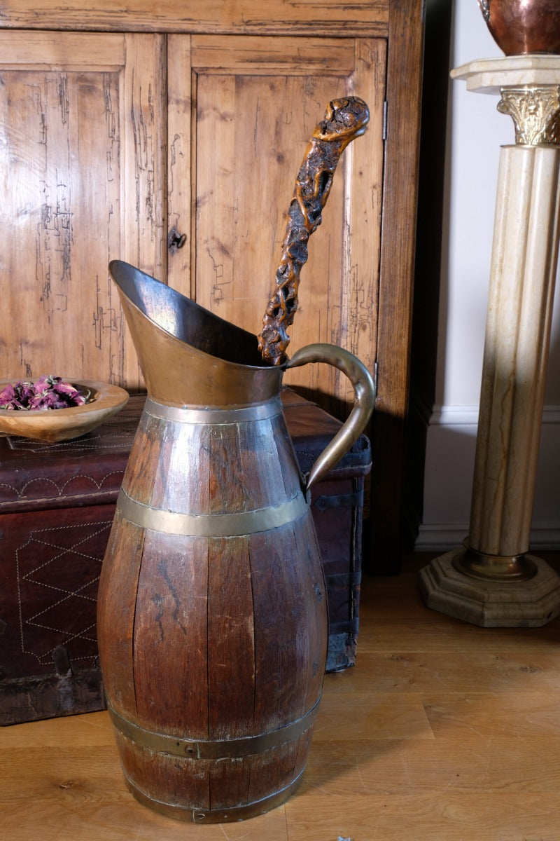 Folk art walking stick in a naturalist root wood form