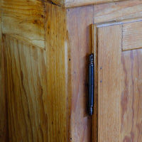 Close up of the stop chamfer corner detail on an Early 20th Century Pitch Pine Single Door Larder Cupboard with Lift-Off Hinges and Original Sprung Latch