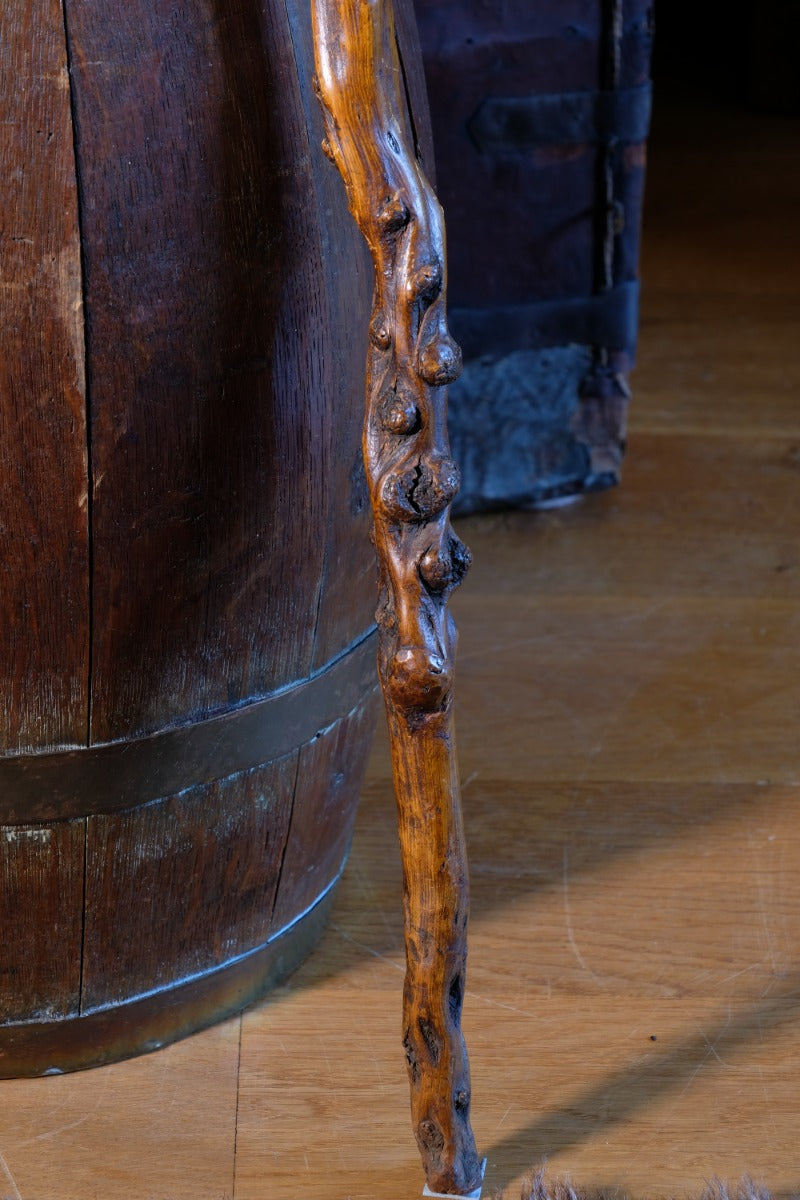 Folk art walking stick in a naturalist root wood form