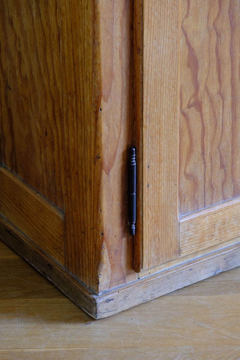 Close up of the brass and steel pin hinges on an Early 20th Century Pitch Pine Single Door Larder Cupboard with Lift-Off Hinges and Original Sprung Latch