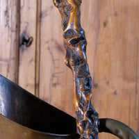 Folk art walking stick in a naturalist root wood form