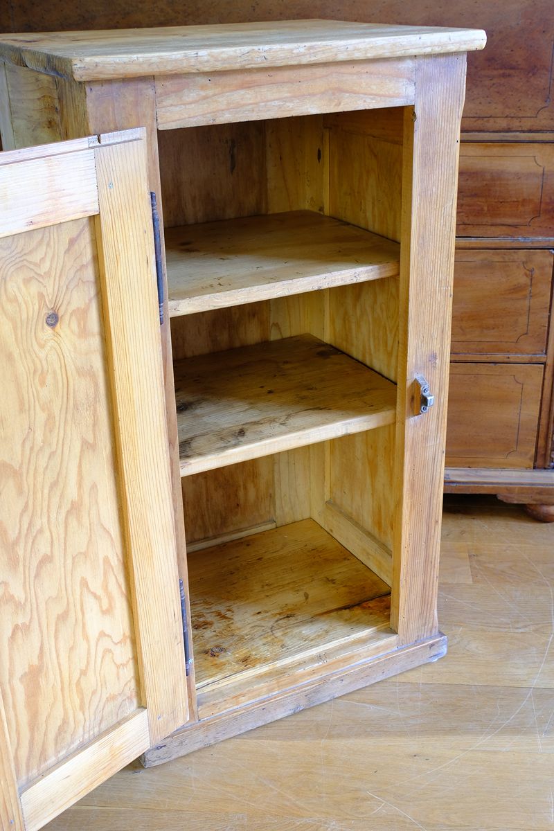 Inside view of the thick  removable shelves on an Early 20th Century Pitch Pine Single Door Larder Cupboard with Lift-Off Hinges and Original Sprung Latch