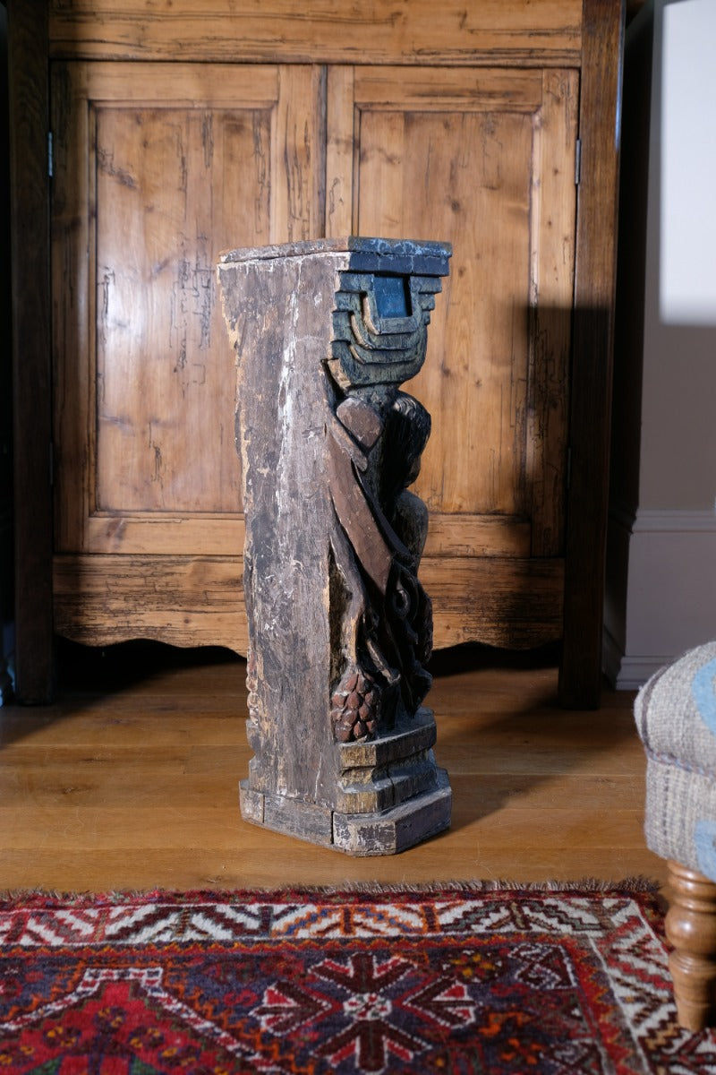 Carved Polychrome Pedestal Sculpture Of A Putto