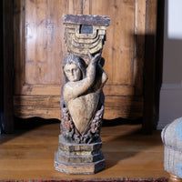 Carved Polychrome Pedestal Sculpture Of A Putto