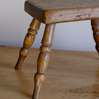 Early 20th Century Oak & Beech Country Stool with Turned Legs showing solid oak seat and turned beech legs