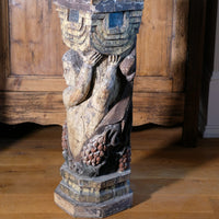 Carved Polychrome Pedestal Sculpture Of A Putto