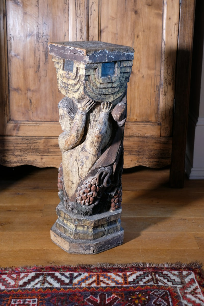 Carved Polychrome Pedestal Sculpture Of A Putto