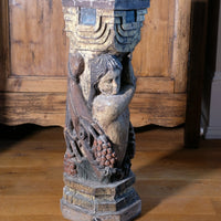 Carved Polychrome Pedestal Sculpture Of A Putto