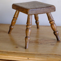 Early 20th Century Oak & Beech Country Stool with Turned Legs showing solid oak seat and turned beech legs