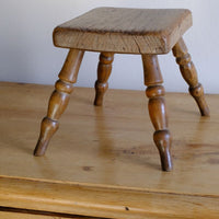 Early 20th Century Oak & Beech Country Stool with Turned Legs showing solid oak seat and turned beech legs