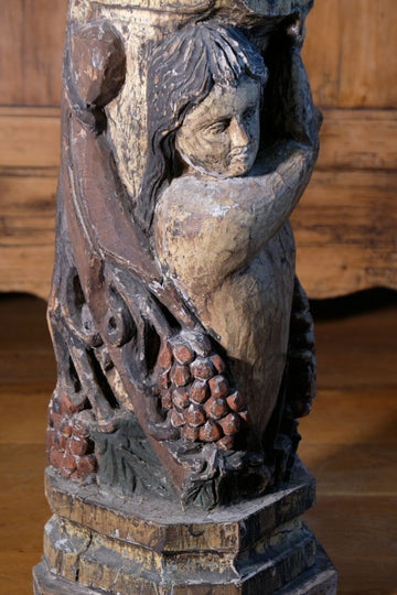 Carved Polychrome Pedestal Sculpture Of A Putto