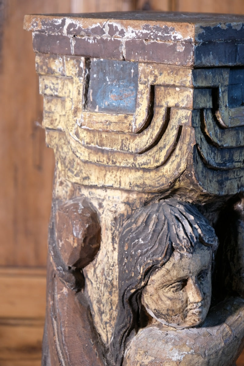 Carved Polychrome Pedestal Sculpture Of A Putto