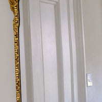 Edwardian Queen Anne Revival carved giltwood wall mirror with Prince of Wales feather crest, c.1900-  