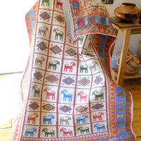 Traditional Persian Sumak wool flatweave rug with repeating goat motifs and geometric design