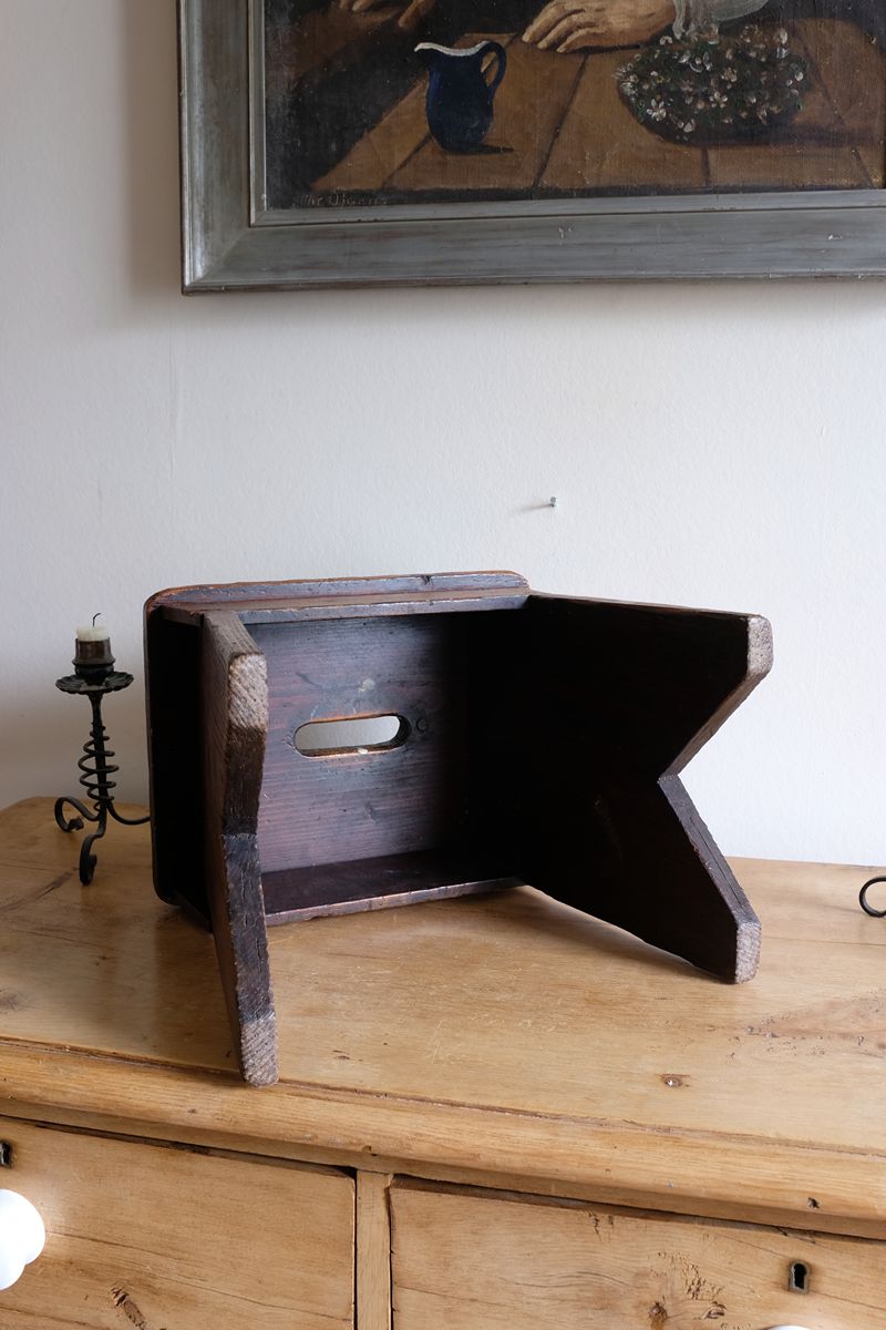 underneath of a 19th Century Vernacular Pine Stool with V-Cut Sides and Worn Grab Handle Seat