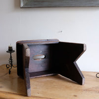 underneath of a 19th Century Vernacular Pine Stool with V-Cut Sides and Worn Grab Handle Seat