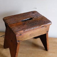 19th Century Vernacular Pine Stool with V-Cut Sides and Worn Grab Handle Seat