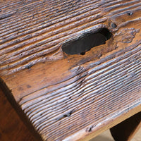 Grab grab hole on a 19th Century Vernacular Pine Stool with V-Cut Sides and Worn Grab Handle Seat