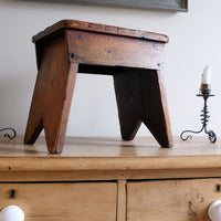 19th Century Vernacular Pine Stool with V-Cut Sides and Worn Grab Handle Seat