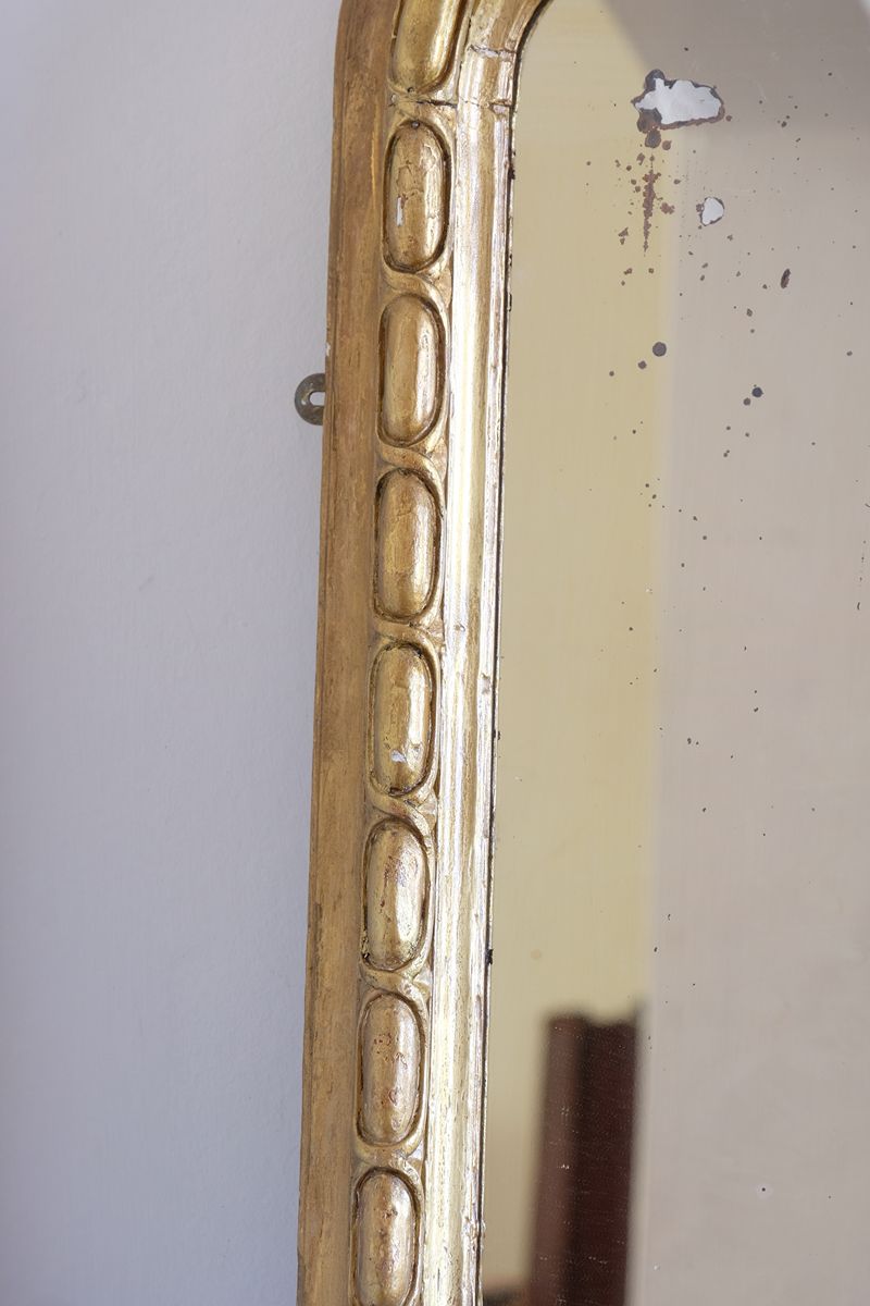 a continuous carved giltwood guilloche border of elongated oval reserves on the Mid-19th Century Giltwood Pier and Overmantel Mirror by John Westley Birmingham