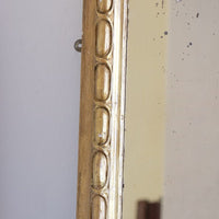 a continuous carved giltwood guilloche border of elongated oval reserves on the Mid-19th Century Giltwood Pier and Overmantel Mirror by John Westley Birmingham