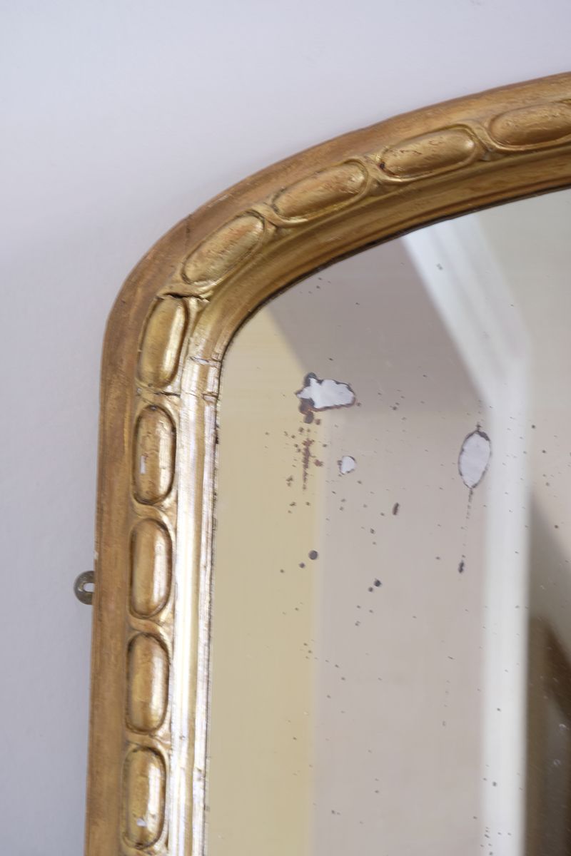 a continuous carved giltwood guilloche border of elongated oval reserves on the Mid-19th Century Giltwood Pier and Overmantel Mirror by John Westley Birmingham